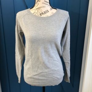 Gray sweater with lace elbow detail